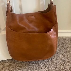 Ahdorned vegan leather cross body w leopard strap